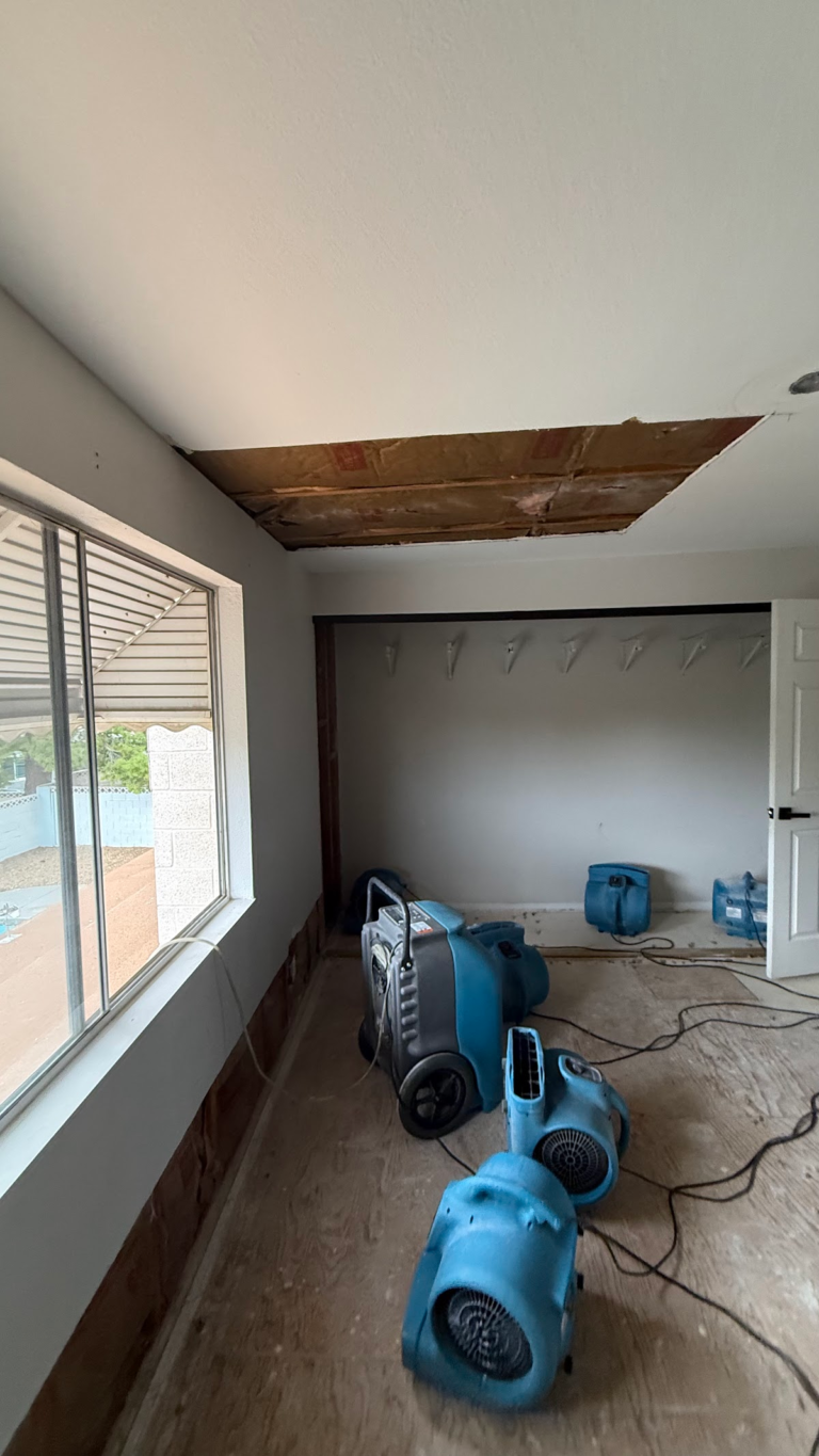 Bedroom drying with dehumidifier and fans during the Las Vegas home restoration project.