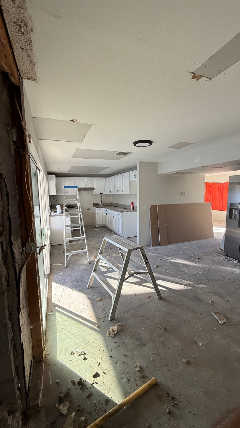 Ceiling drywall replacement and work platform during the Las Vegas home restoration project.