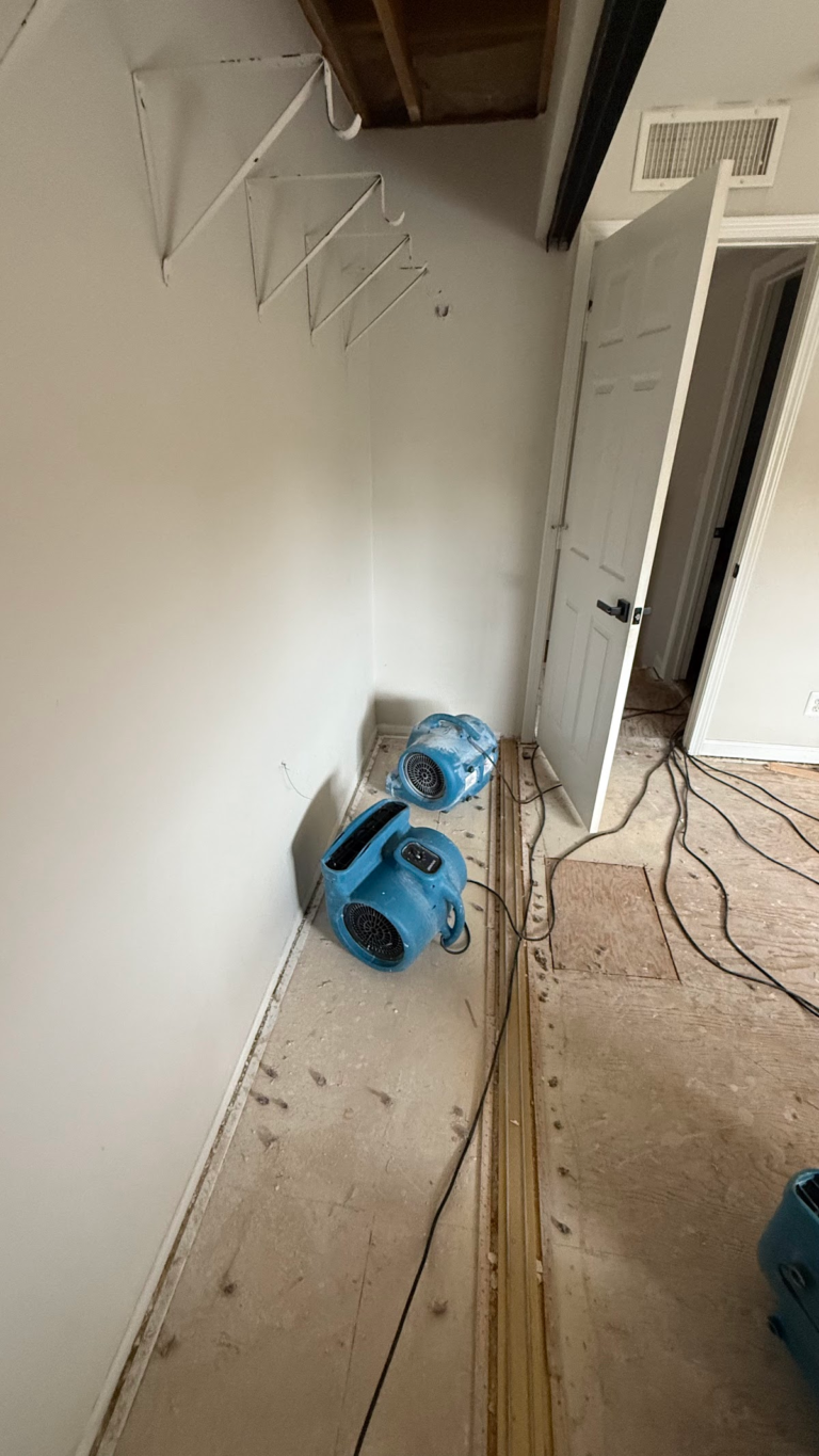 Closet drying with removed flooring during the Las Vegas home restoration project.