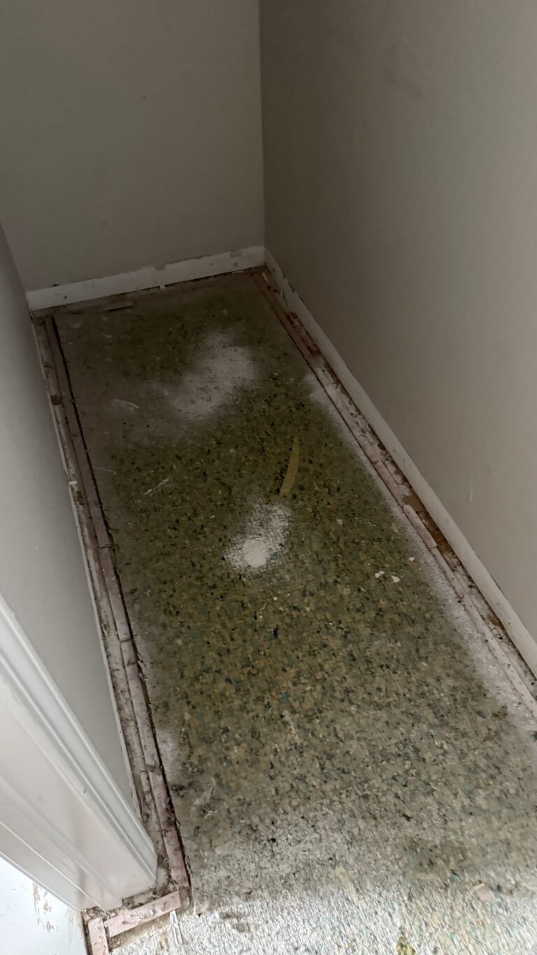 Closet floor during water-damage assessment during the Las Vegas home restoration project.