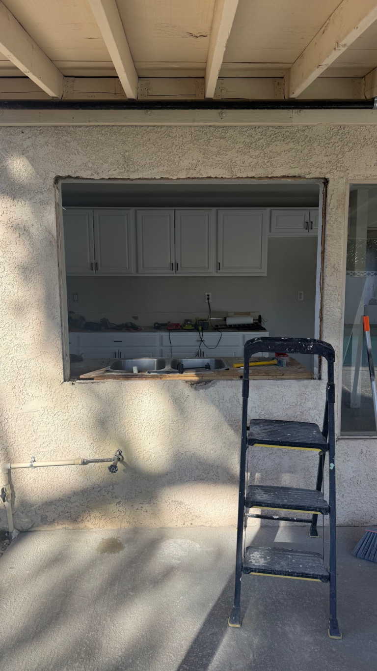 Exterior window opening during renovation during the Las Vegas home restoration project.