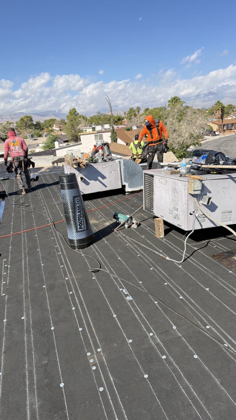 Flat roof seams around ventilation equipment during the Las Vegas home restoration project.