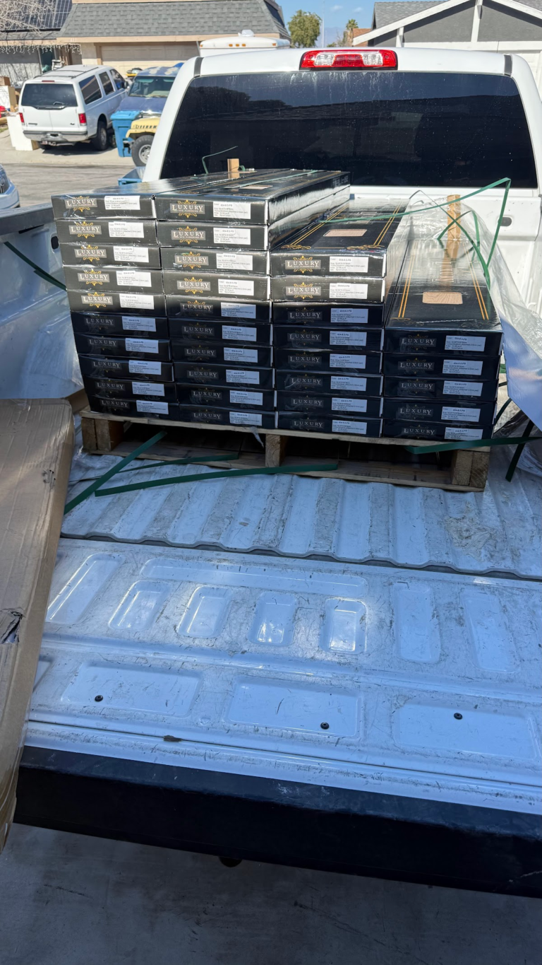 Flooring materials loaded on pickup truck during the Las Vegas home restoration project.