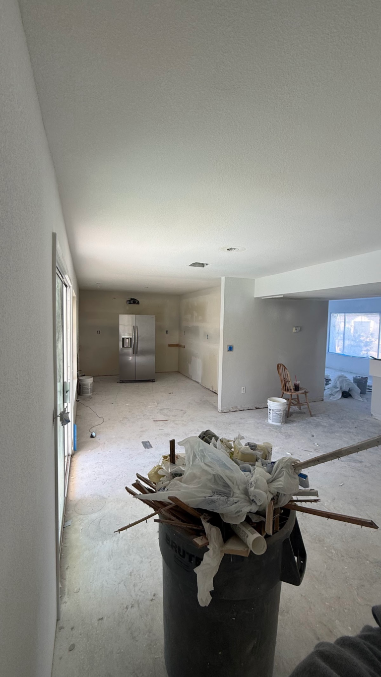 Interior painting and surface preparation during the Las Vegas home restoration project.