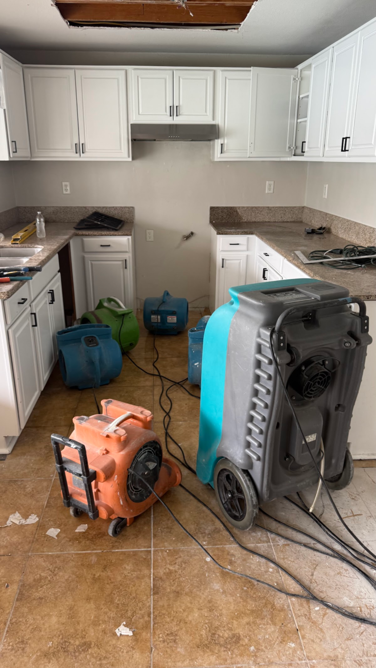 Kitchen dehumidifier and air movers during the Las Vegas home restoration project.