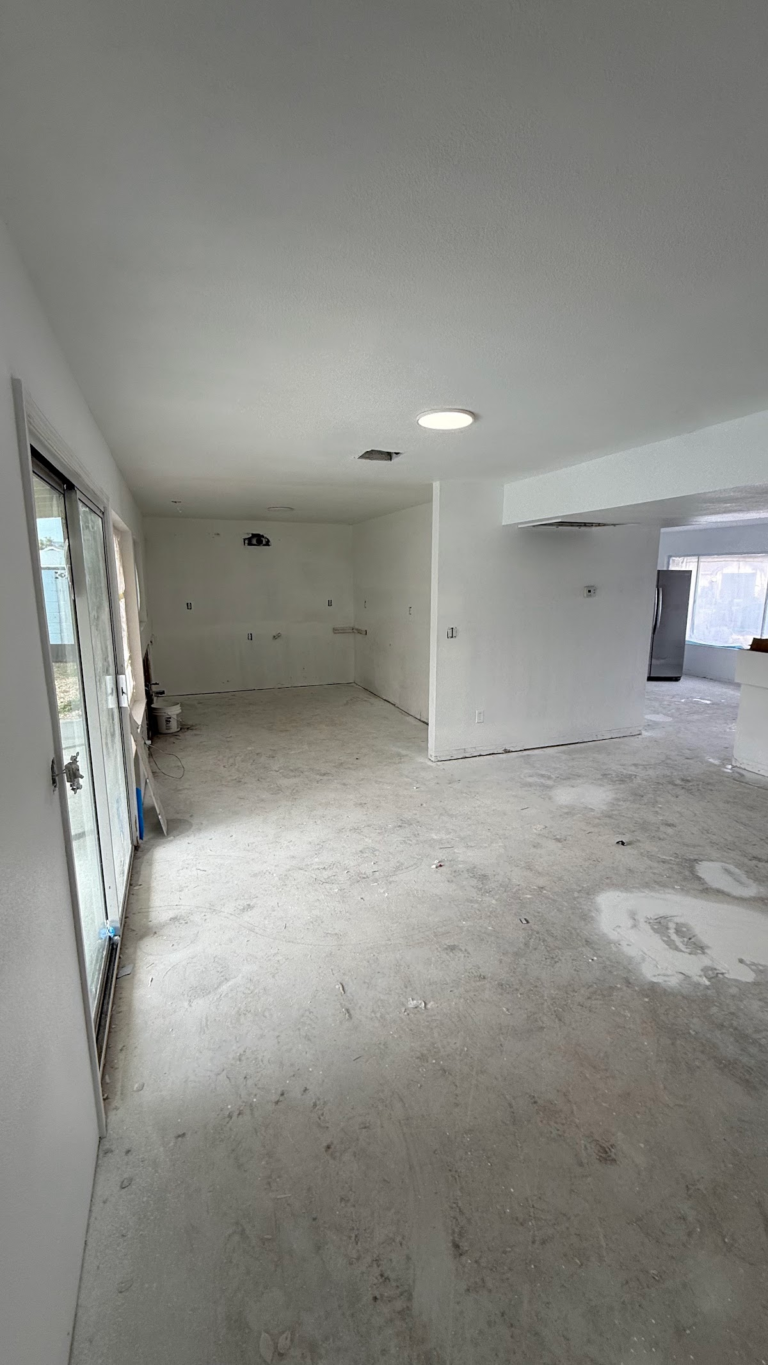 Living area prepared for flooring installation during the Las Vegas home restoration project.