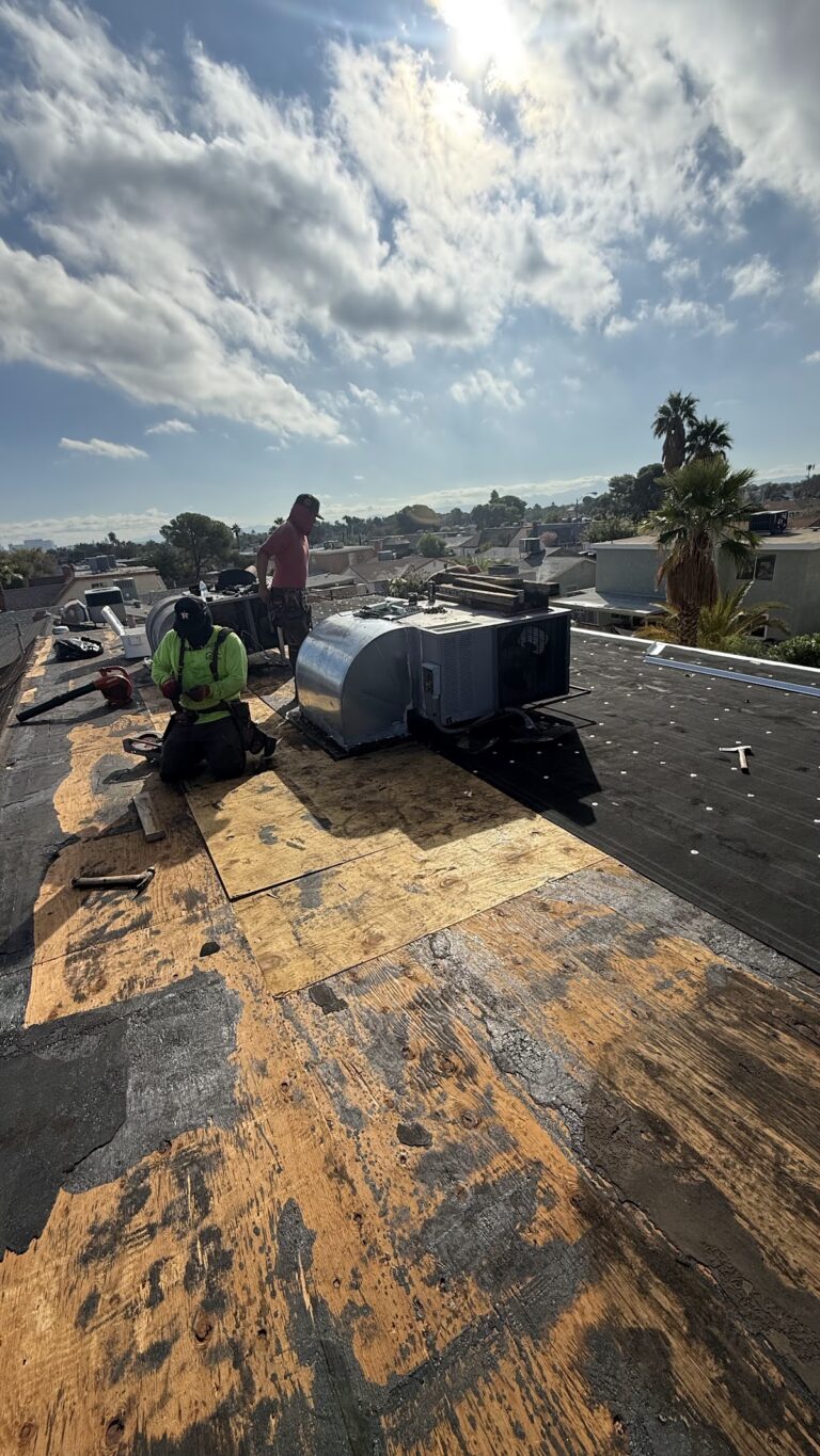 Roof decking and stripped roofing membrane during the Las Vegas home restoration project.