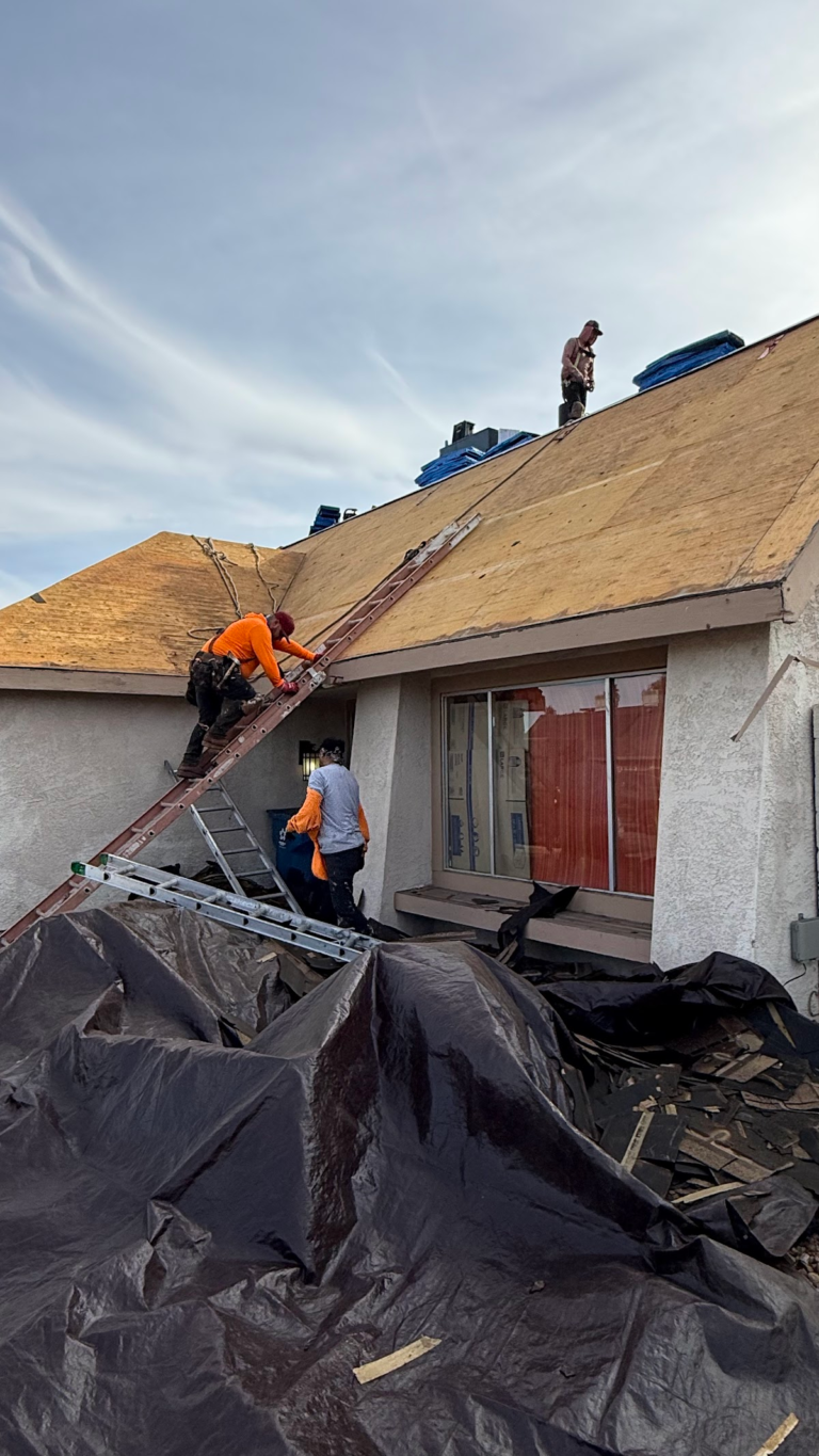 Roof decking replacement above protected entry during the Las Vegas home restoration project.