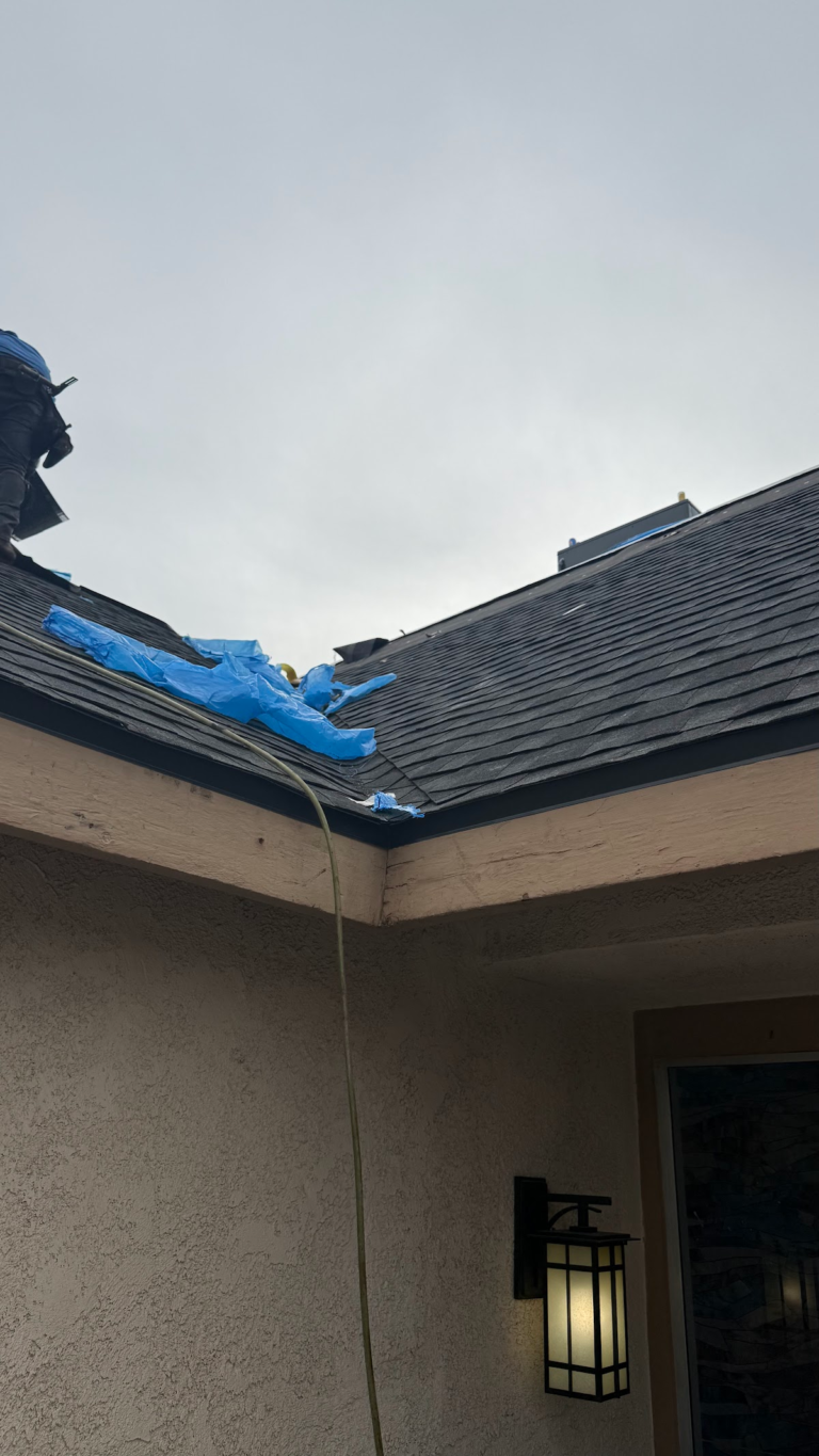 Roof edge with underlayment and shingles during the Las Vegas home restoration project.