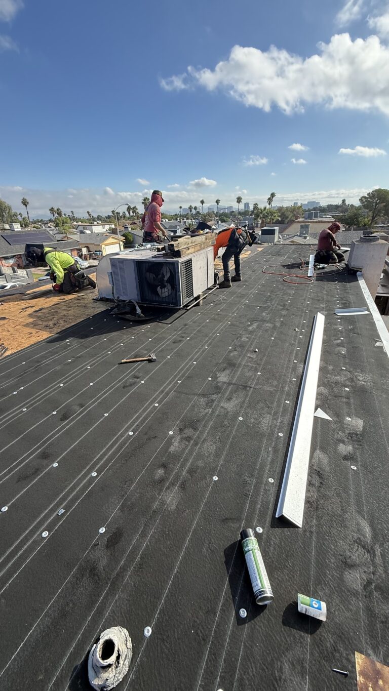 Roof membrane seams and pipe penetration during the Las Vegas home restoration project.