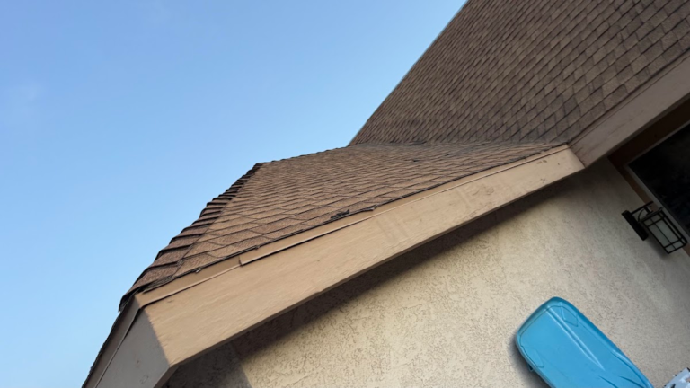 Shingle roof edge and fascia before replacement during the Las Vegas home restoration project.